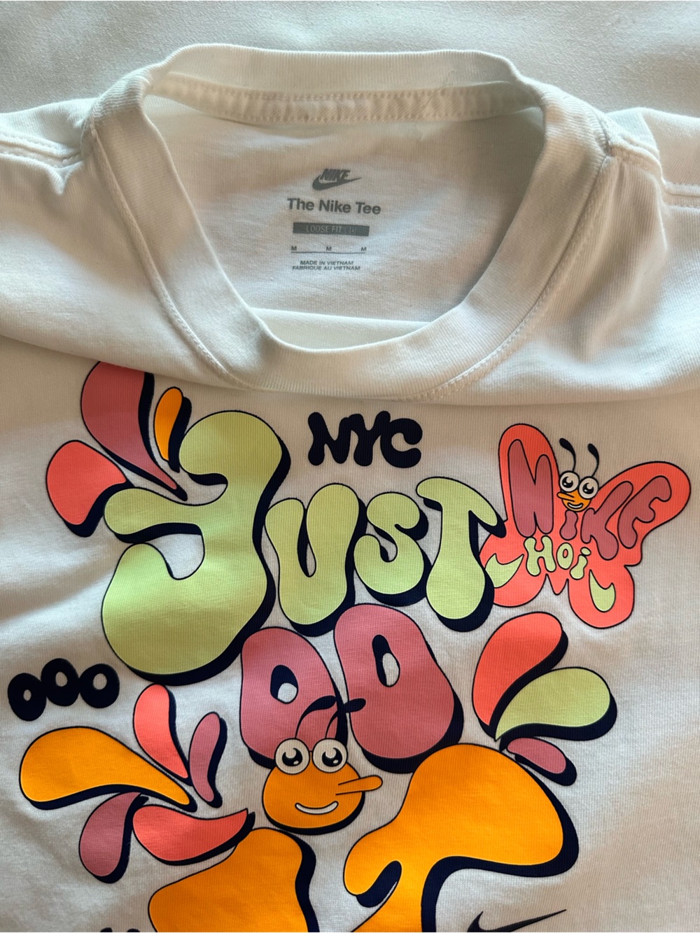 Nike White Long-Sleeve Tee with Neon Green, Orange, Pink & Yellow Graphic